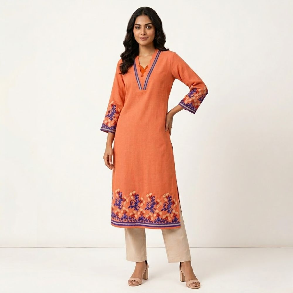 Women orange embroidered kurti with floral design